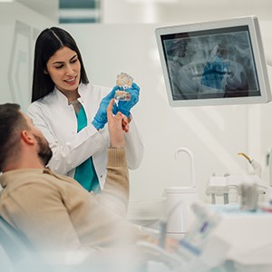 Man listening to dentist during consultation