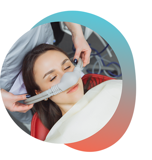 Woman receiving nitrous oxide sedation in dental chair