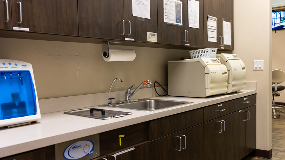 Sink on cabinet in dental office