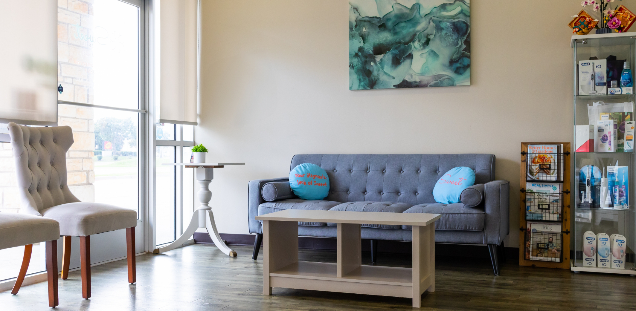 Couch in waiting room of Rowlett dental office