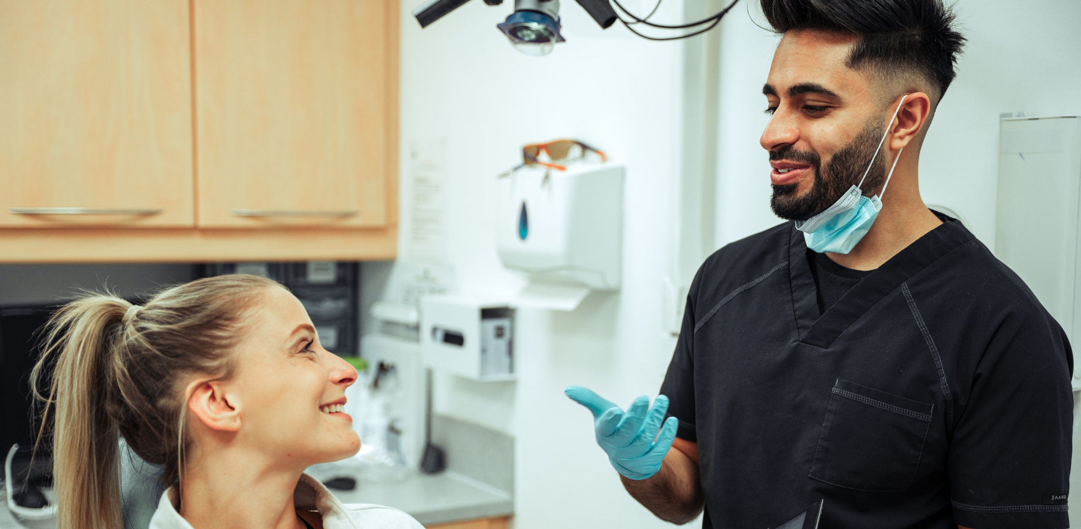 Female patient visiting male dentist for restorative dentistry in Rowlett